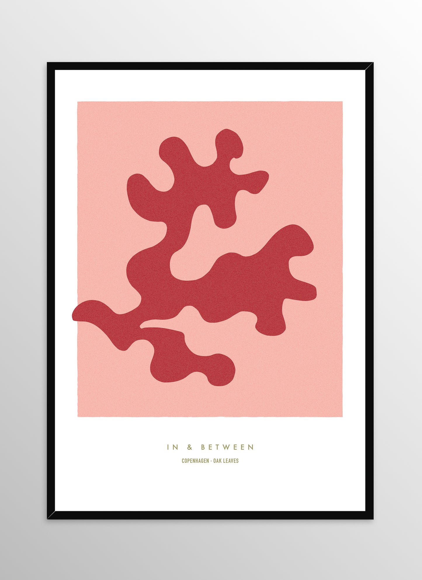 Art print of strawberry ice red oak leaf and background in black wooden frame.