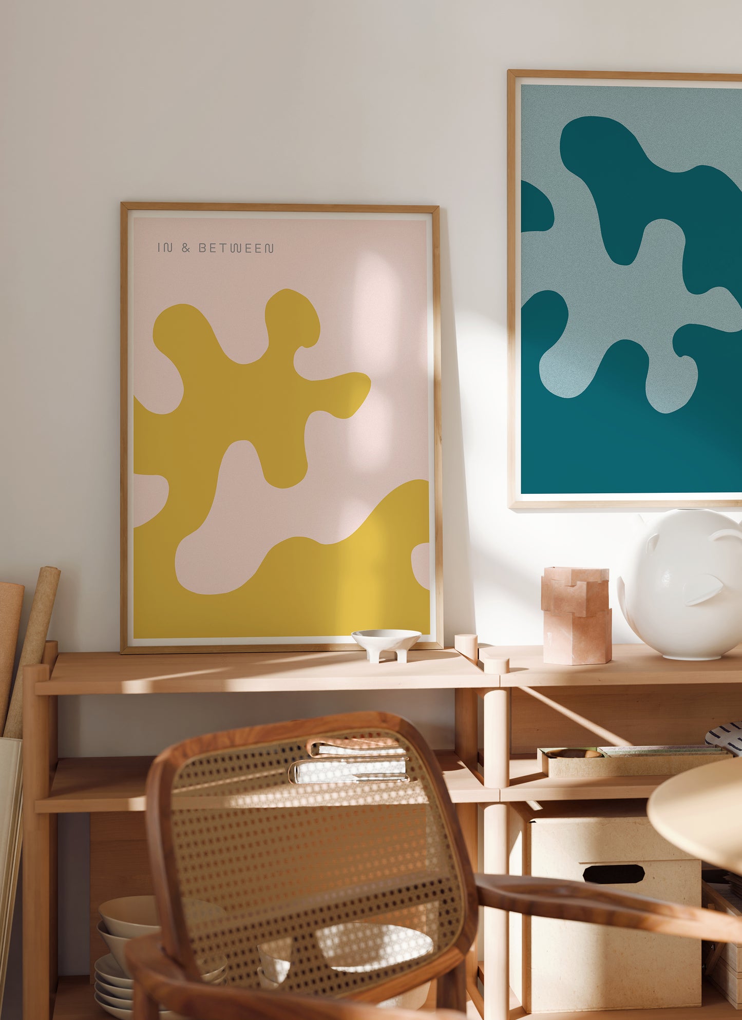 Lifestyle image of In and Between art print of large deep blue and light blue oak leaf and background in natural wooden frame.