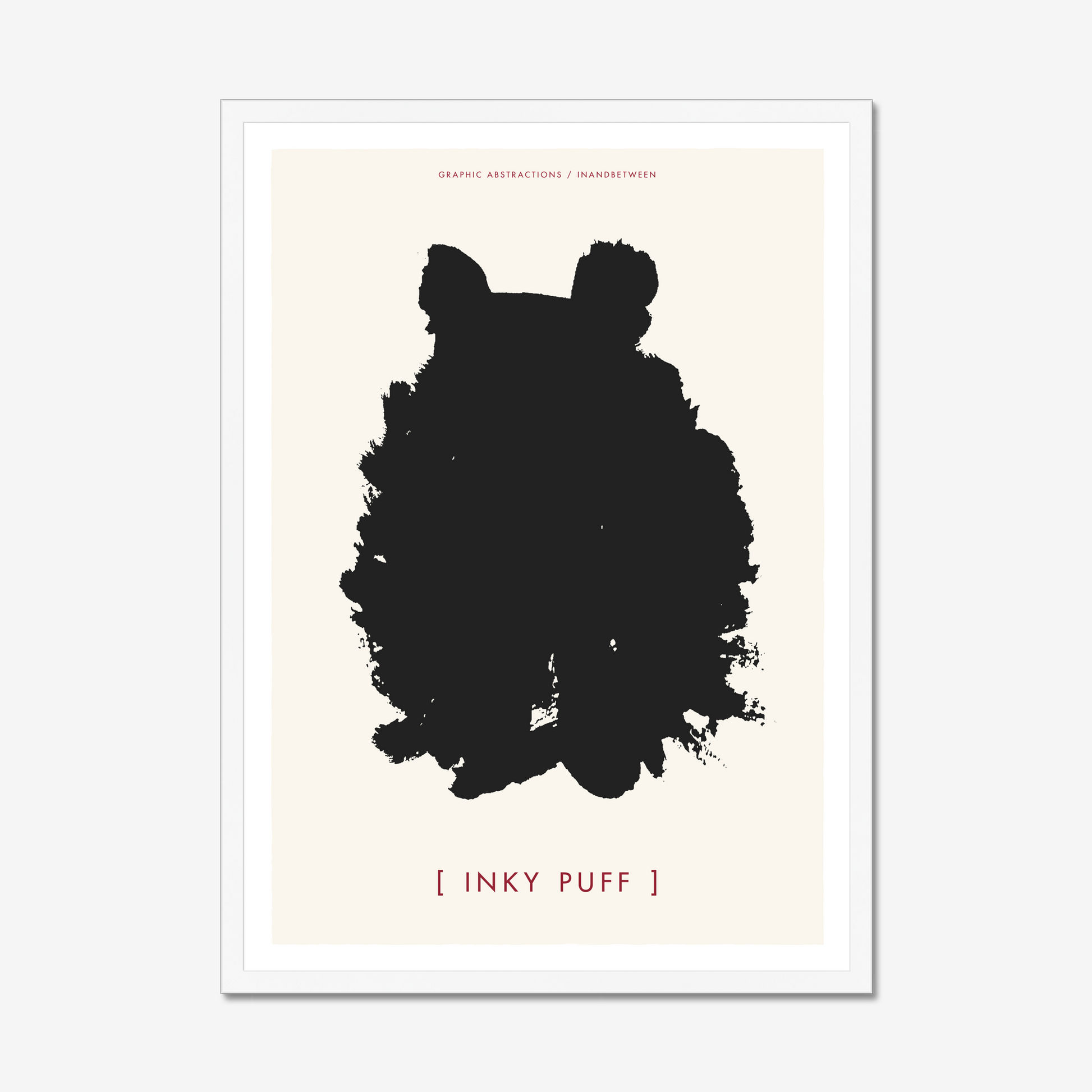 Art print in white wood frame showing ink black fluffy creature with ears on a cream background.