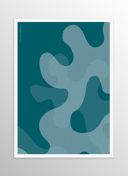 Art print of large deep ocean blue oak leaf shapes in white wooden frame.