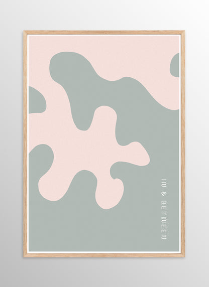 Art print of large soft pink oak leaf on grey background in natural wooden frame.