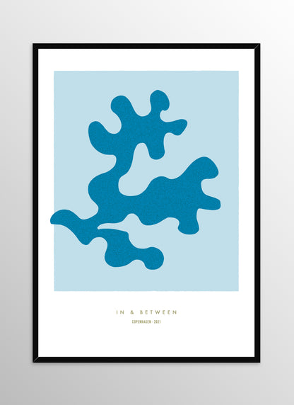 Art print oak leaf and background in light blue in black wooden frame.