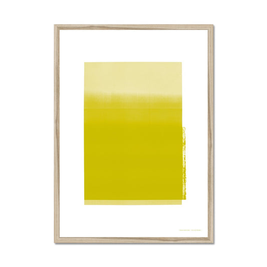 Natural wood framed giclee print depicting golden yellow horizon within wide white border. From being completely saturated at the bottom the pigments of colour slowly spread out upwards until it fades into space at the top like the horizon.