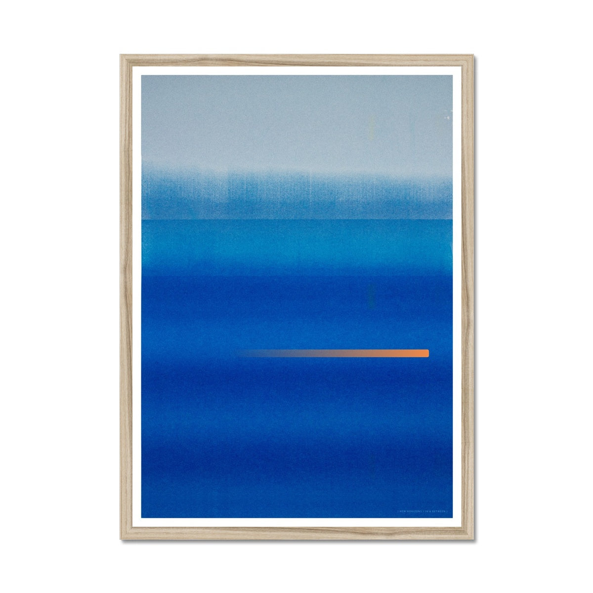 Natural wood framed giclee print depicting a vibrant blue horizon. From being completely saturated at the bottom the pigments of colour slowly spread out upwards until it fades into space at the top like the horizon.