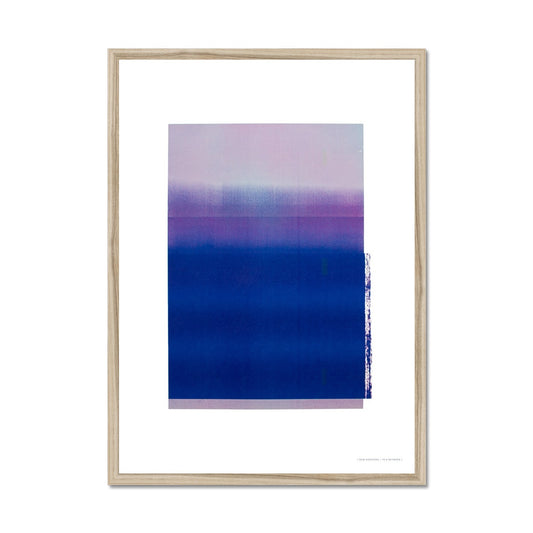 Natural wood framed giclee print depicting a vibrant violet horizon within a wide white border. From being completely saturated at the bottom the pigments of colour slowly spread out upwards until it fades into space at the top like the horizon.