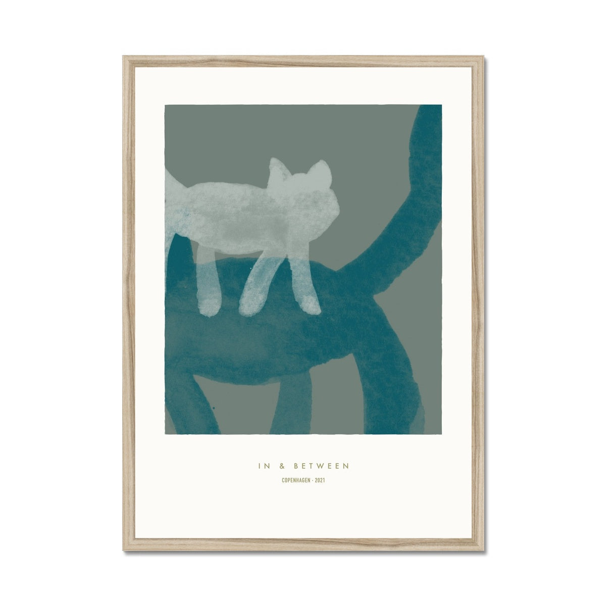 Small light grey cat perched on back of larger green cat on grey background in natural wooden frame.