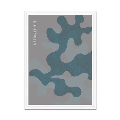 Art print of overlapping oak leaves in grey shades in white wooden frame.