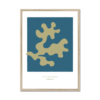 Art print of golden oak leaf on dark blue background in natural wooden frame.