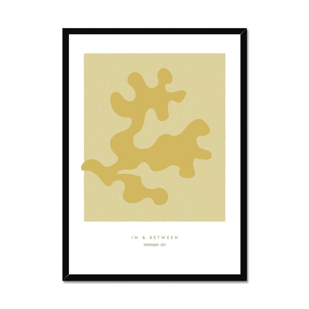 Art print of maple coloured oak leaf on a lighter maple background with white space around in black wooden frame.