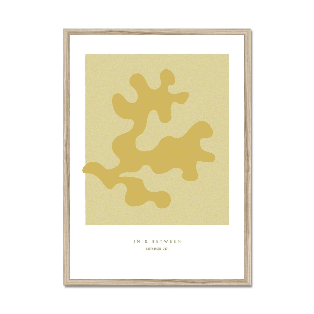 Art print of maple coloured oak leaf on a lighter maple background with white space around in natural wooden frame.