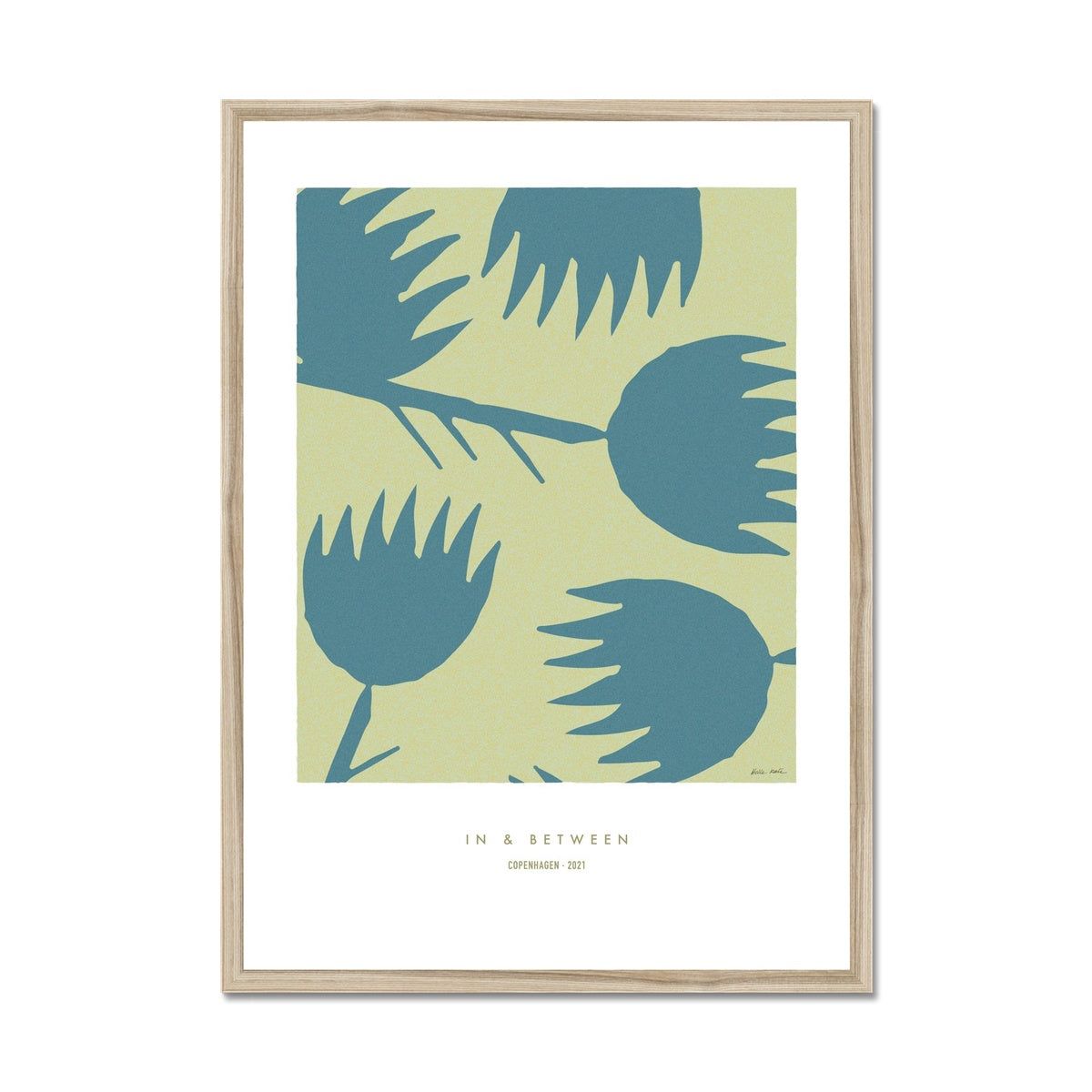 Art print of blue thistles on a light green background with white space around and a natural wooden frame.