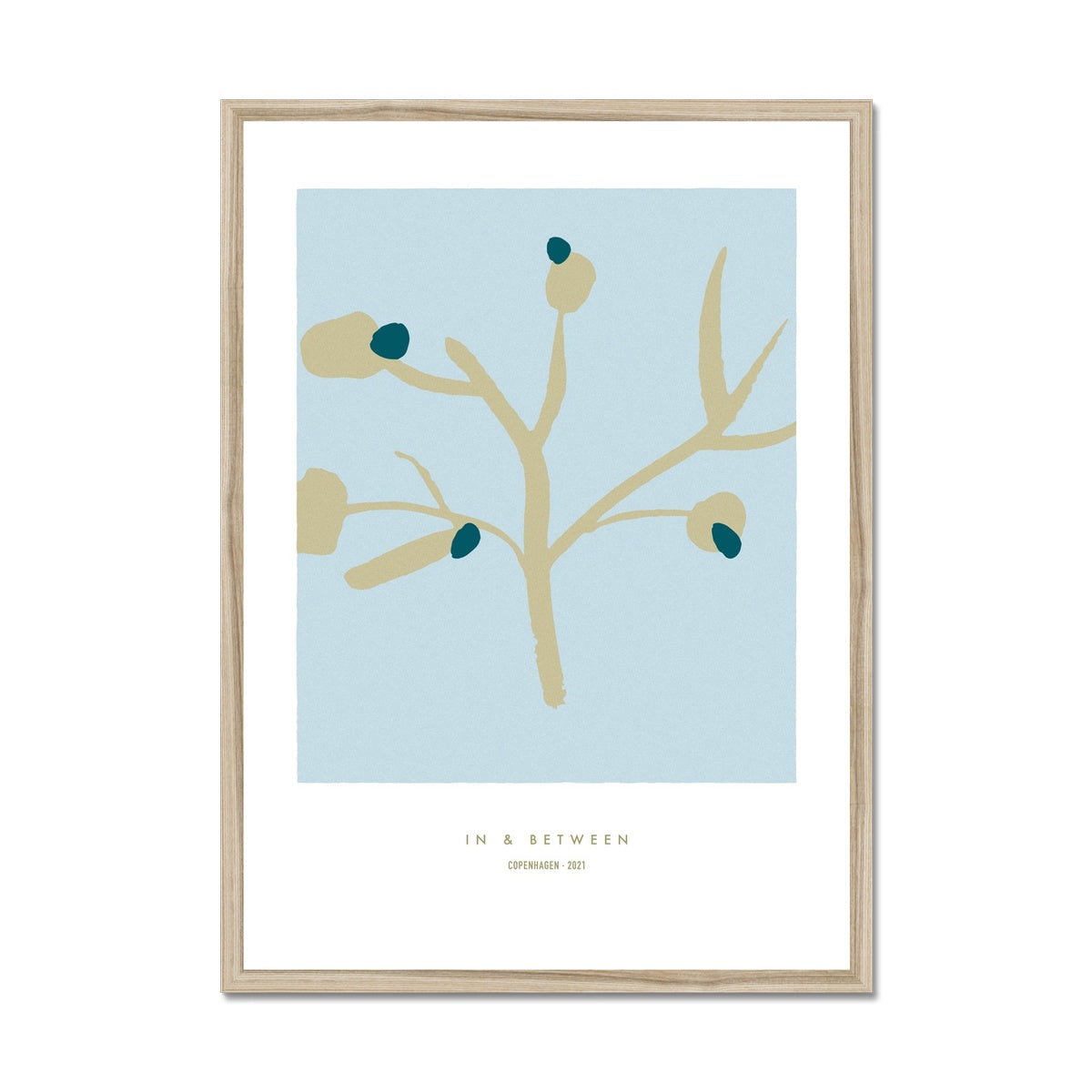 Upright golden olive tree branch with dark green olives on a light blue background in a natural wooden frame.